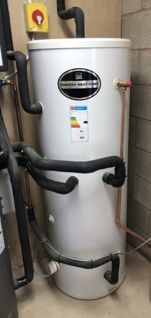 a hot water cylinder fully plumbed in situ
