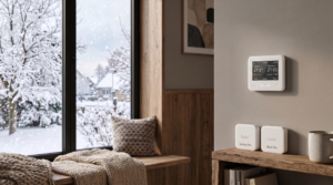 a warm room with snow outside